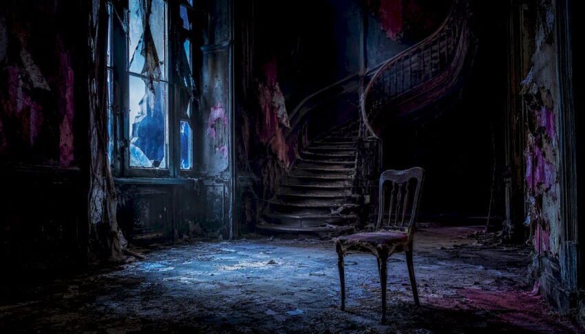 Gothic mansion interior with eerie lighting