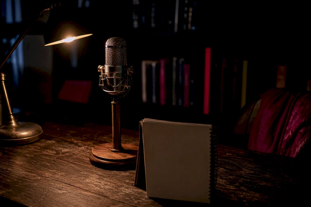 Home podcast studio with microphone and lamp