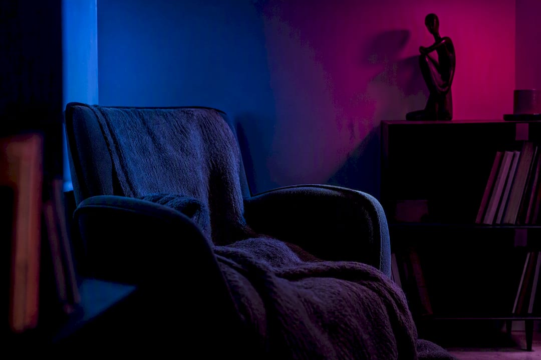 Room with colored lights and symbolic shadows