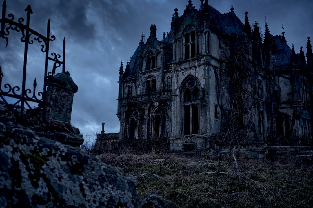 Foggy Gothic mansion at dusk