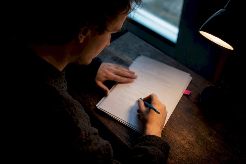Writer revising a horror manuscript