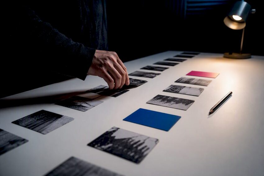 Writer arranging horror beat cards