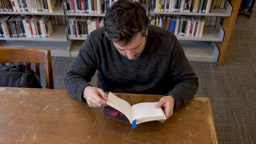 Reader weighing a horror book's content notes